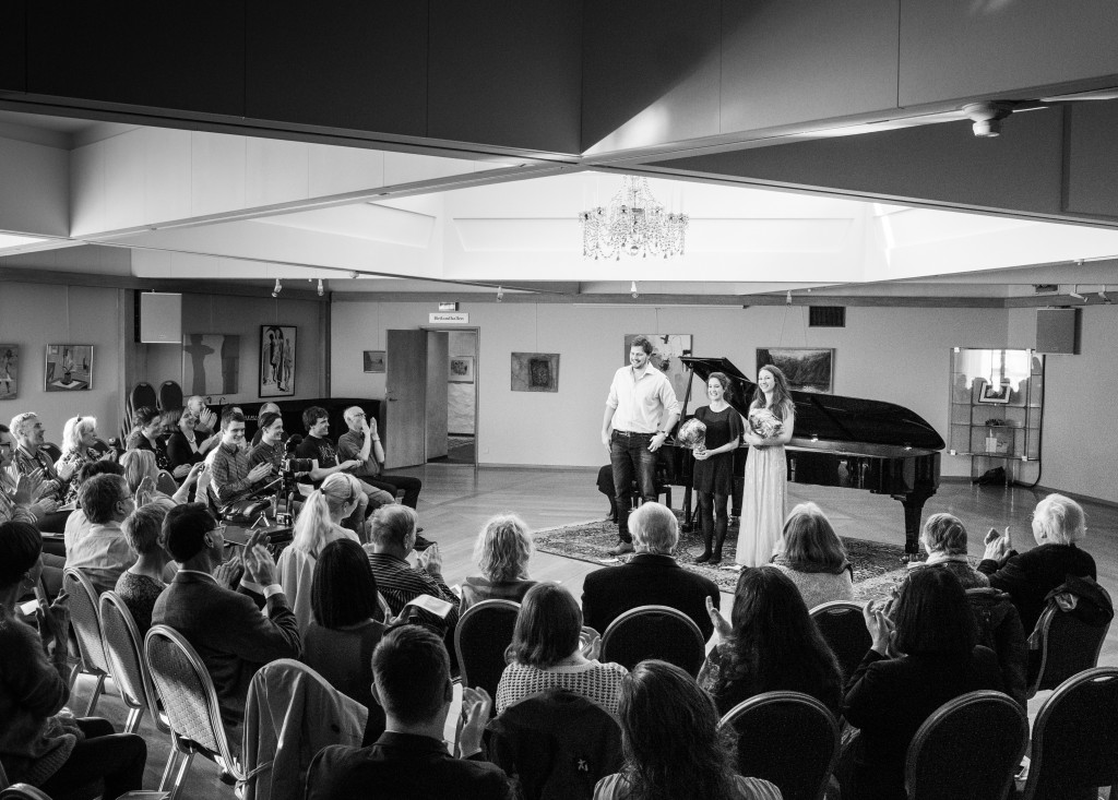 David Spittle, Lucy Armstrong and Ingvild Schultze-Florey receive applause after a performance of Nadja's Song in Bergen, Norway